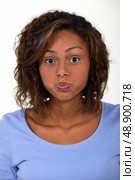 Young woman pouting. Стоковое фото, агентство Ingram Publishing / Фотобанк Лори