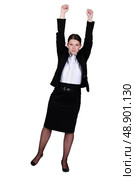 A businesswoman with her two fists up. Стоковое фото, агентство Ingram Publishing / Фотобанк Лори