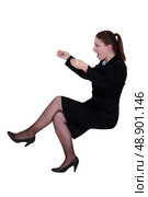 Shocked businesswoman reading an imaginary paper. Стоковое фото, агентство Ingram Publishing / Фотобанк Лори
