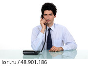 Businessman making a call. Стоковое фото, агентство Ingram Publishing / Фотобанк Лори