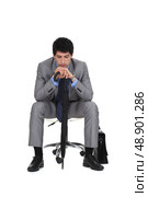 Bored businessman waiting with an umbrella. Стоковое фото, агентство Ingram Publishing / Фотобанк Лори