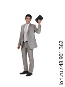 Businessman holding his leather-bound agenda. Стоковое фото, агентство Ingram Publishing / Фотобанк Лори