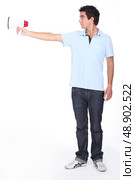 Boy using a megaphone. Стоковое фото, агентство Ingram Publishing / Фотобанк Лори