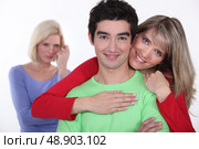 Woman jealous of couple. Стоковое фото, агентство Ingram Publishing / Фотобанк Лори