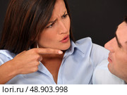 Woman blaming her husband. Стоковое фото, агентство Ingram Publishing / Фотобанк Лори