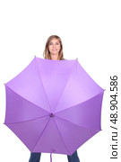 Young woman posing with an open umbrella in bright purple. Стоковое фото, агентство Ingram Publishing / Фотобанк Лори