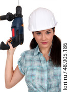 Worker with a power drill. Стоковое фото, агентство Ingram Publishing / Фотобанк Лори