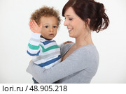Child waving good-bye. Стоковое фото, агентство Ingram Publishing / Фотобанк Лори