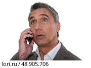 Surprised man looking at a screen. Стоковое фото, агентство Ingram Publishing / Фотобанк Лори