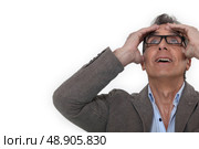smiling middle-aged man looking upwards. Стоковое фото, агентство Ingram Publishing / Фотобанк Лори