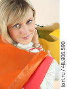 Woman with her shopping bags. Стоковое фото, агентство Ingram Publishing / Фотобанк Лори
