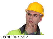 Portrait of pensive worker. Стоковое фото, агентство Ingram Publishing / Фотобанк Лори