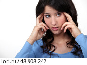 Woman suffering from headache. Стоковое фото, агентство Ingram Publishing / Фотобанк Лори
