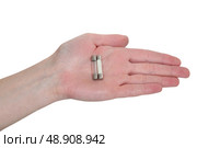 A hand holding fuses. Стоковое фото, агентство Ingram Publishing / Фотобанк Лори
