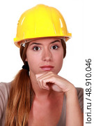 A pensive tradeswoman. Стоковое фото, агентство Ingram Publishing / Фотобанк Лори