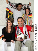Group of German soccer supporters. Стоковое фото, агентство Ingram Publishing / Фотобанк Лори