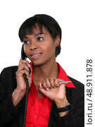 Woman flirting over the phone. Стоковое фото, агентство Ingram Publishing / Фотобанк Лори