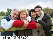 Adult couples in the countryside. Стоковое фото, агентство Ingram Publishing / Фотобанк Лори