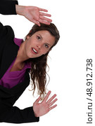 Woman waving hands. Стоковое фото, агентство Ingram Publishing / Фотобанк Лори