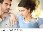 Concerned young couple. Стоковое фото, агентство Ingram Publishing / Фотобанк Лори
