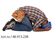 Tradesman with his head in his hands. Стоковое фото, агентство Ingram Publishing / Фотобанк Лори
