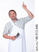 Butcher pointing. Стоковое фото, агентство Ingram Publishing / Фотобанк Лори