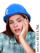 A tired-looking tradeswoman. Стоковое фото, агентство Ingram Publishing / Фотобанк Лори