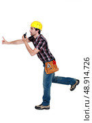 A foreman trying to prevent something bad from happening. Стоковое фото, агентство Ingram Publishing / Фотобанк Лори