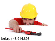 Laborer with vernier calipers. Стоковое фото, агентство Ingram Publishing / Фотобанк Лори