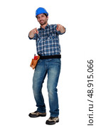 cool craftsman pointing at you. Стоковое фото, агентство Ingram Publishing / Фотобанк Лори