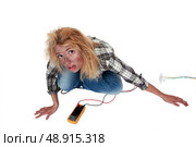 Woman having had an electric shock. Стоковое фото, агентство Ingram Publishing / Фотобанк Лори