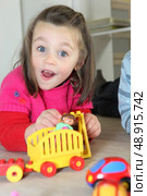 Young child playing with her toys. Стоковое фото, агентство Ingram Publishing / Фотобанк Лори