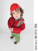 Small boy pretending to be foreman. Стоковое фото, агентство Ingram Publishing / Фотобанк Лори