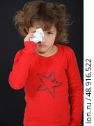 Girl drying her tears. Стоковое фото, агентство Ingram Publishing / Фотобанк Лори