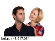 Woman persuading her husband. Стоковое фото, агентство Ingram Publishing / Фотобанк Лори