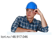 Anxious young builder. Стоковое фото, агентство Ingram Publishing / Фотобанк Лори