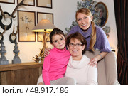 Girl with her mother and grandmother. Стоковое фото, агентство Ingram Publishing / Фотобанк Лори