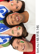 A group of people supporting the Italian football team. Стоковое фото, агентство Ingram Publishing / Фотобанк Лори