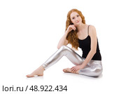 Young redhead girl in tight leggings. Стоковое фото, агентство Ingram Publishing / Фотобанк Лори