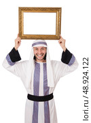 Young arab with picture frame on white. Стоковое фото, агентство Ingram Publishing / Фотобанк Лори