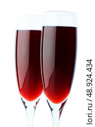 Two wine glasses on the white background. Стоковое фото, агентство Ingram Publishing / Фотобанк Лори