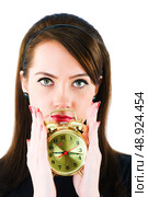Woman with clock isolated on the white. Стоковое фото, агентство Ingram Publishing / Фотобанк Лори