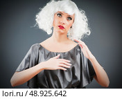 Blonde puppet in studio shooting. Стоковое фото, агентство Ingram Publishing / Фотобанк Лори