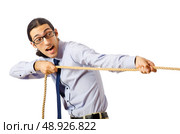 Businessman in tug of war concept. Стоковое фото, агентство Ingram Publishing / Фотобанк Лори