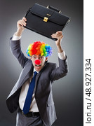 Clown businessman in funny business concept. Стоковое фото, агентство Ingram Publishing / Фотобанк Лори