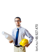 Engineer working with drawings on white. Стоковое фото, агентство Ingram Publishing / Фотобанк Лори