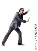 Businessman pushing away virtual problems. Стоковое фото, агентство Ingram Publishing / Фотобанк Лори