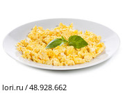 scrambled Eggs with basil on white background. Стоковое фото, агентство Ingram Publishing / Фотобанк Лори