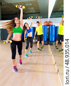 zumba dance cardio people group training at fitness gym workout exercise. Стоковое фото, агентство Ingram Publishing / Фотобанк Лори