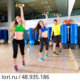 zumba dance cardio people group training at fitness gym workout exercise. Стоковое фото, агентство Ingram Publishing / Фотобанк Лори